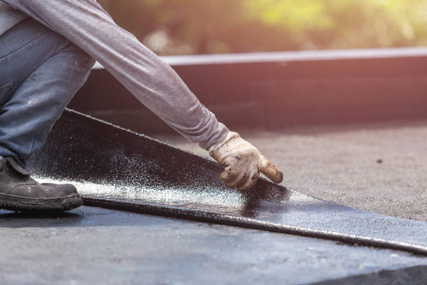 Professional Emergency Waterproofing technician working in East Greenville, PA